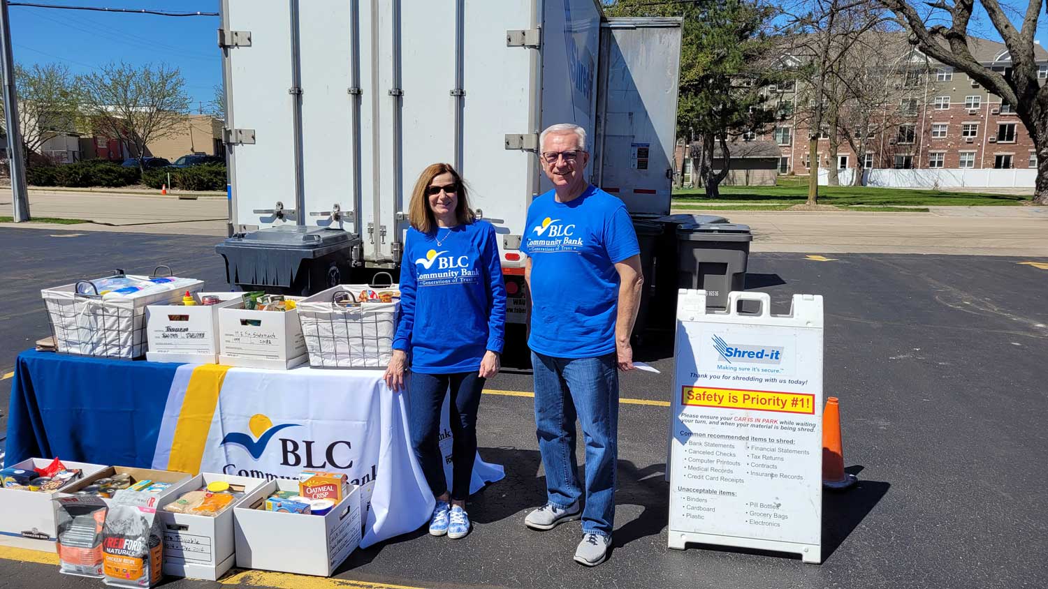 BLC employees Terri and Dave pose for a picture while helping out at our annual Shredfest event.